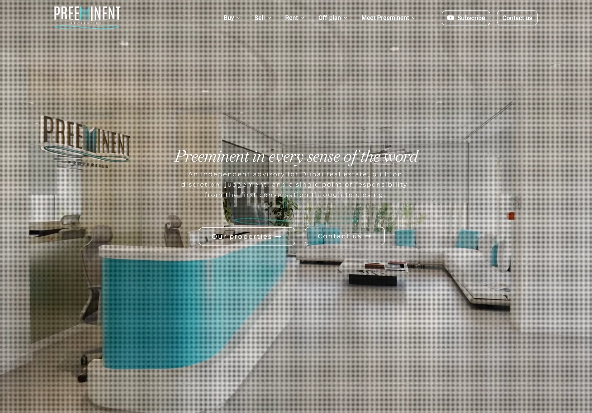 Modern office reception area with turquoise curved desk, white furnishings, and minimalist decor